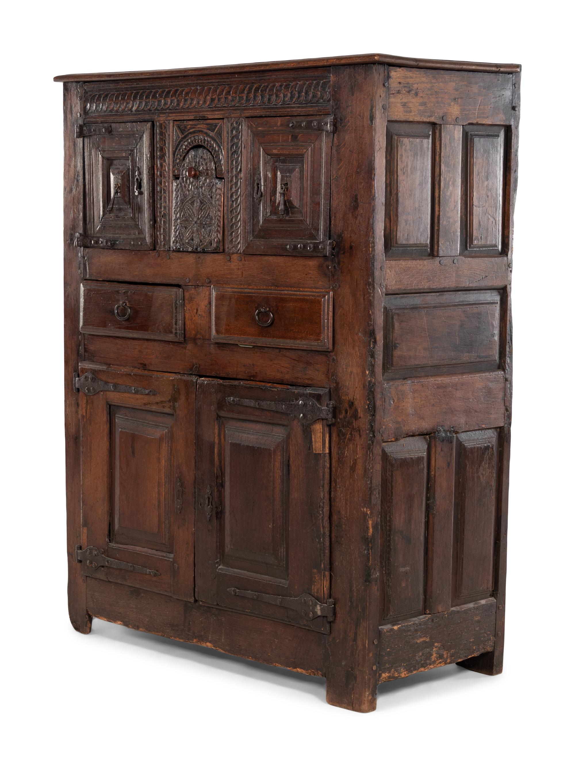 A Spanish Carved Walnut Cabinet