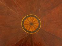 An English Marquetry Inlaid Parcel Ebonized Mahogany Center Table