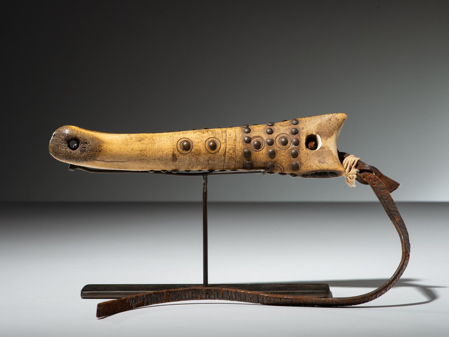 Plains Tacked and Decorated Bone Quirt