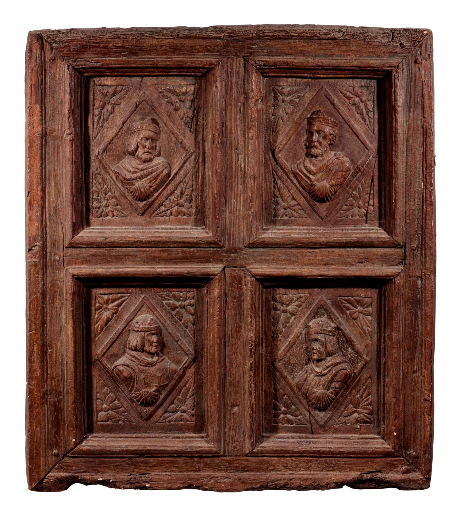 A Continental Terra Cotta Panel Cast from a Cabinet Door