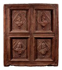 A Continental Terra Cotta Panel Cast from a Cabinet Door