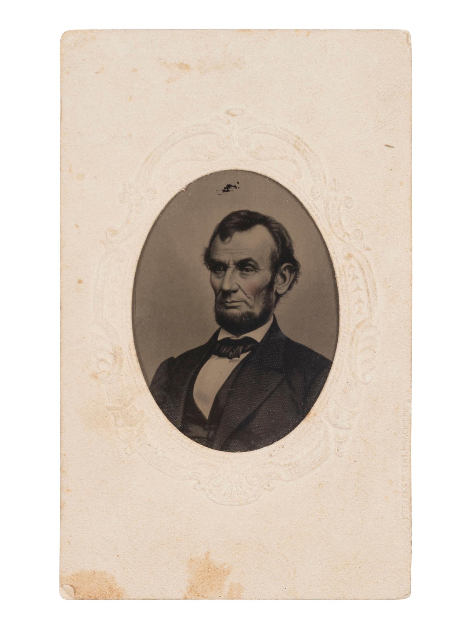 [LINCOLN, Abraham (1809-1865)]. Hand-tinted tintype of Abraham Lincoln after photograph originally taken by Anthony BERGER.