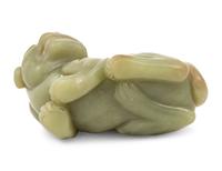 A Chinese Green Jade Figure of a Mythical Beast — 20TH CENTURY