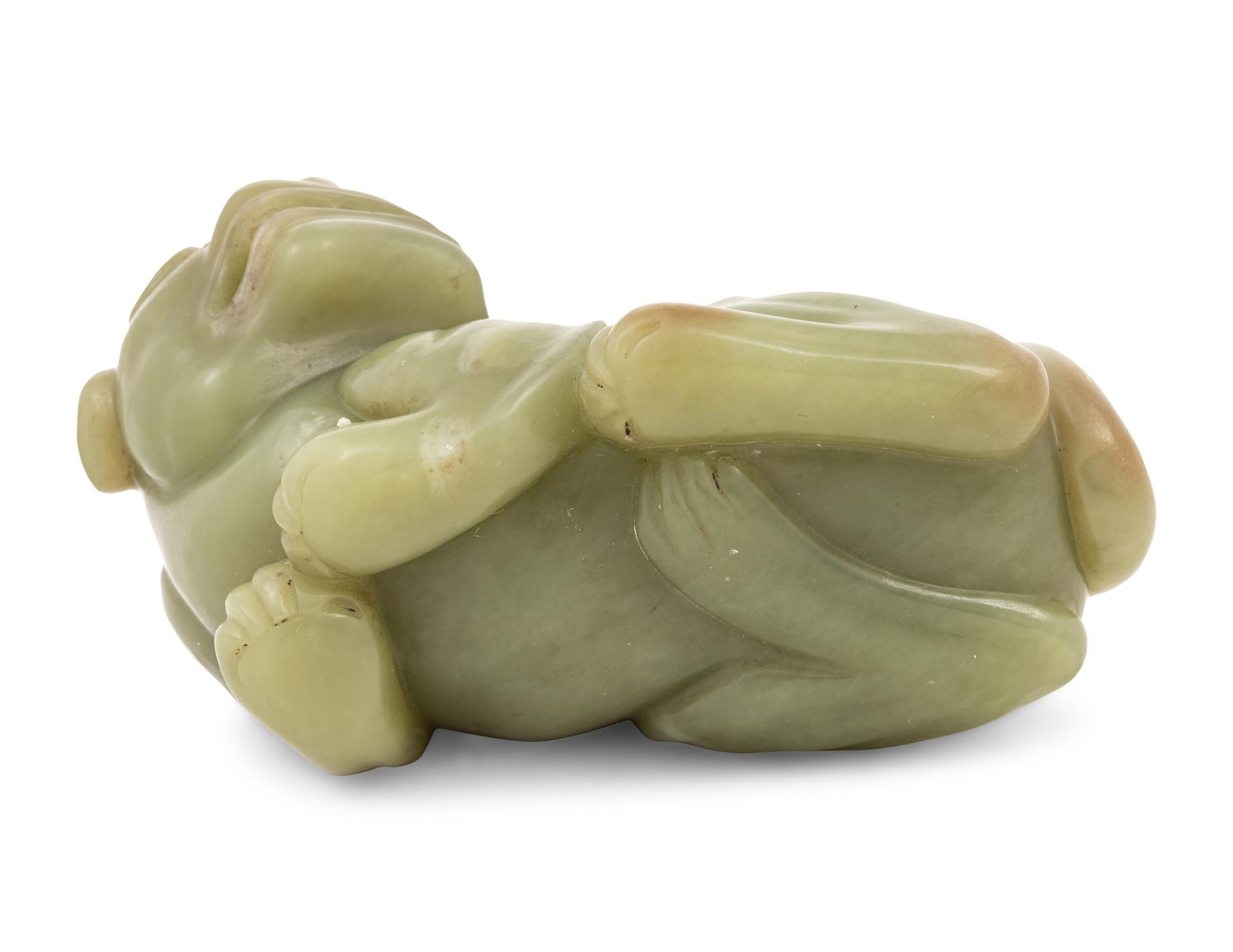 A Chinese Green Jade Figure of a Mythical Beast — 20TH CENTURY
