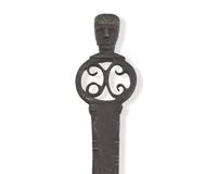 A Copper-Inlaid Wrought Iron Slotted Spoon with Human Head-Form Terminals, Possibly Spanish, 17th Century