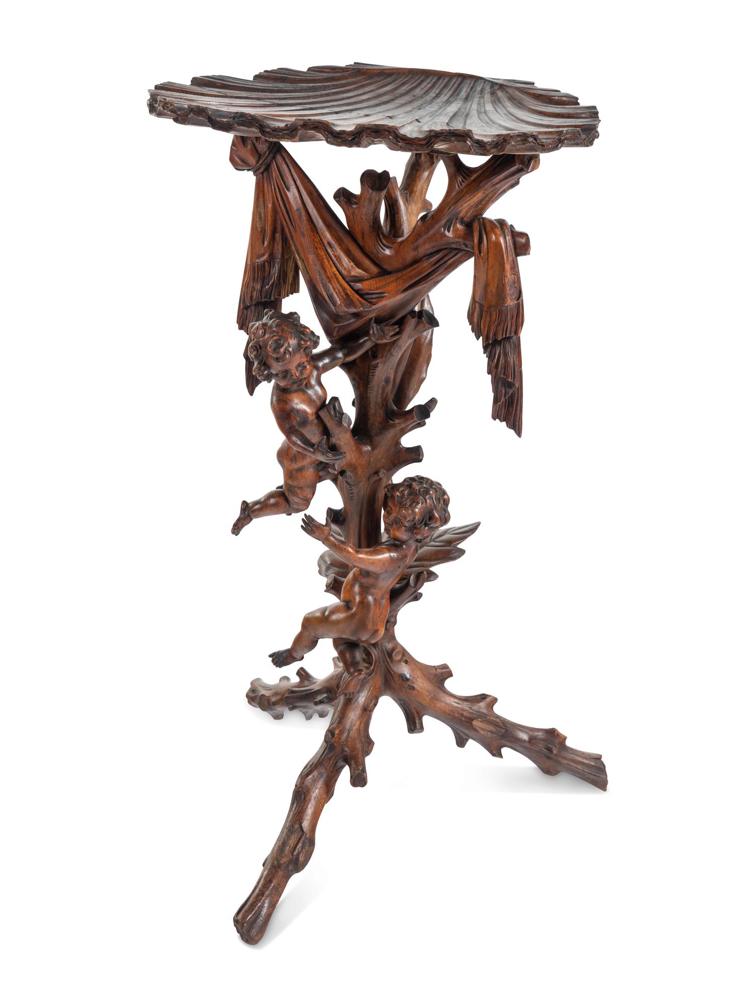 A Venetian Carved Walnut Figural Pedestal