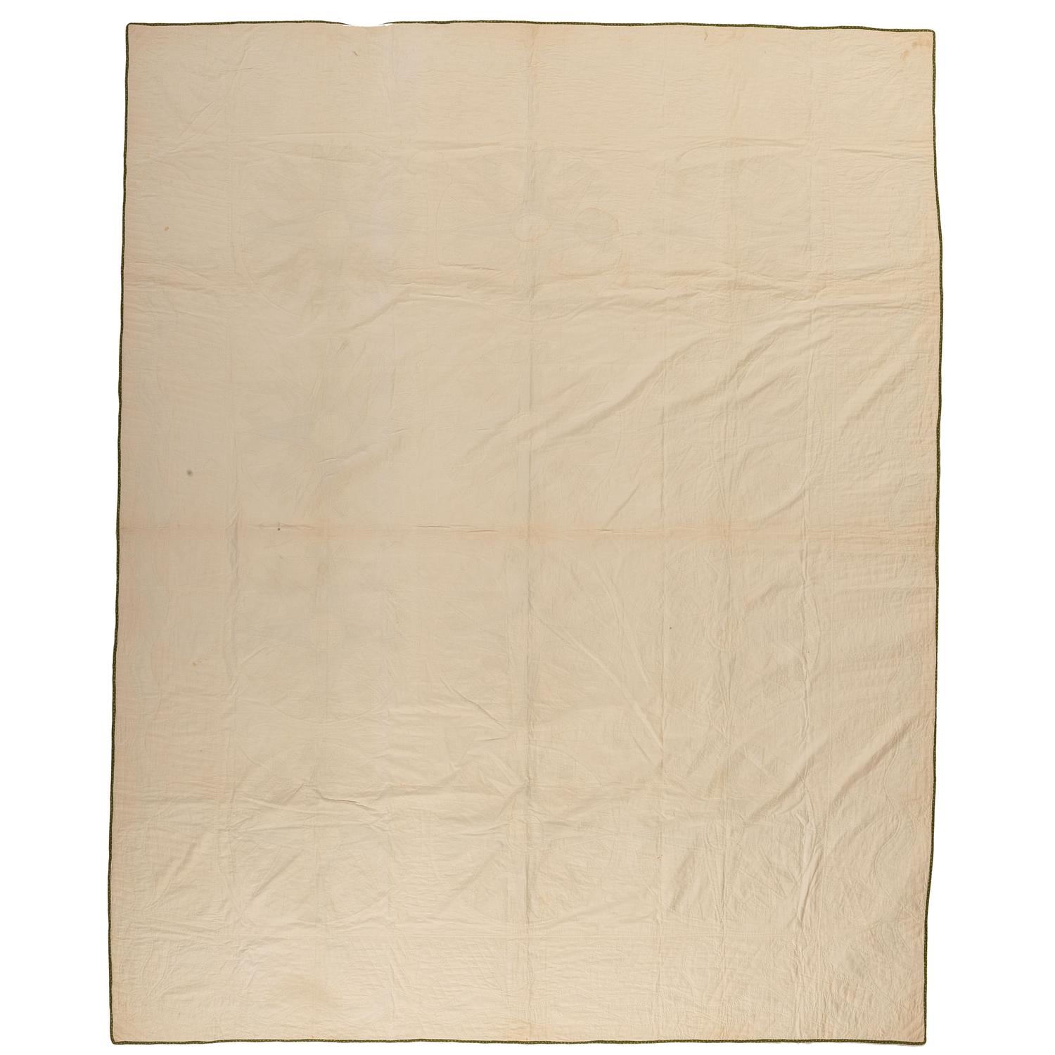 A Mariner's Compass Pattern Quilt with Oak Leaves