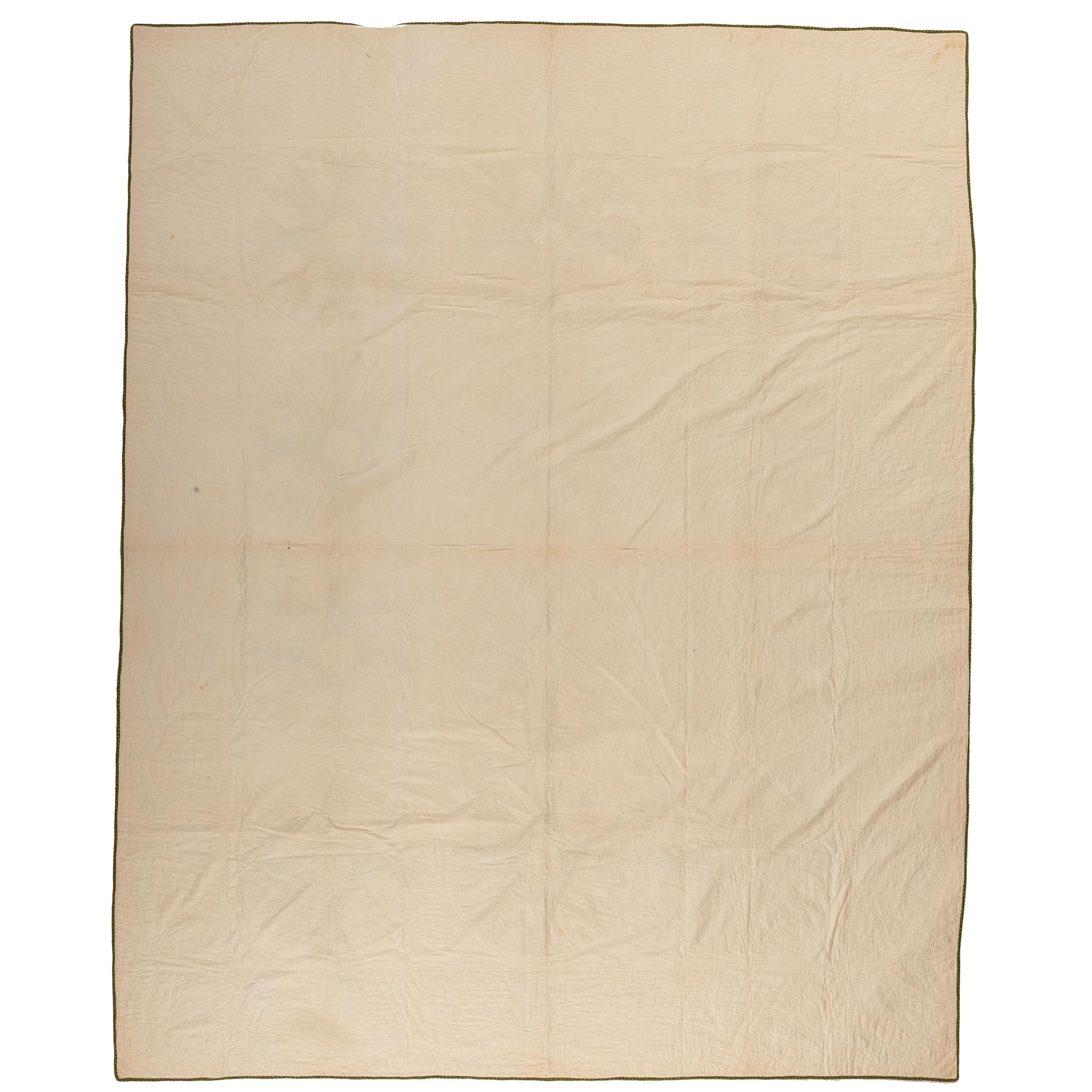 A Mariner's Compass Pattern Quilt with Oak Leaves