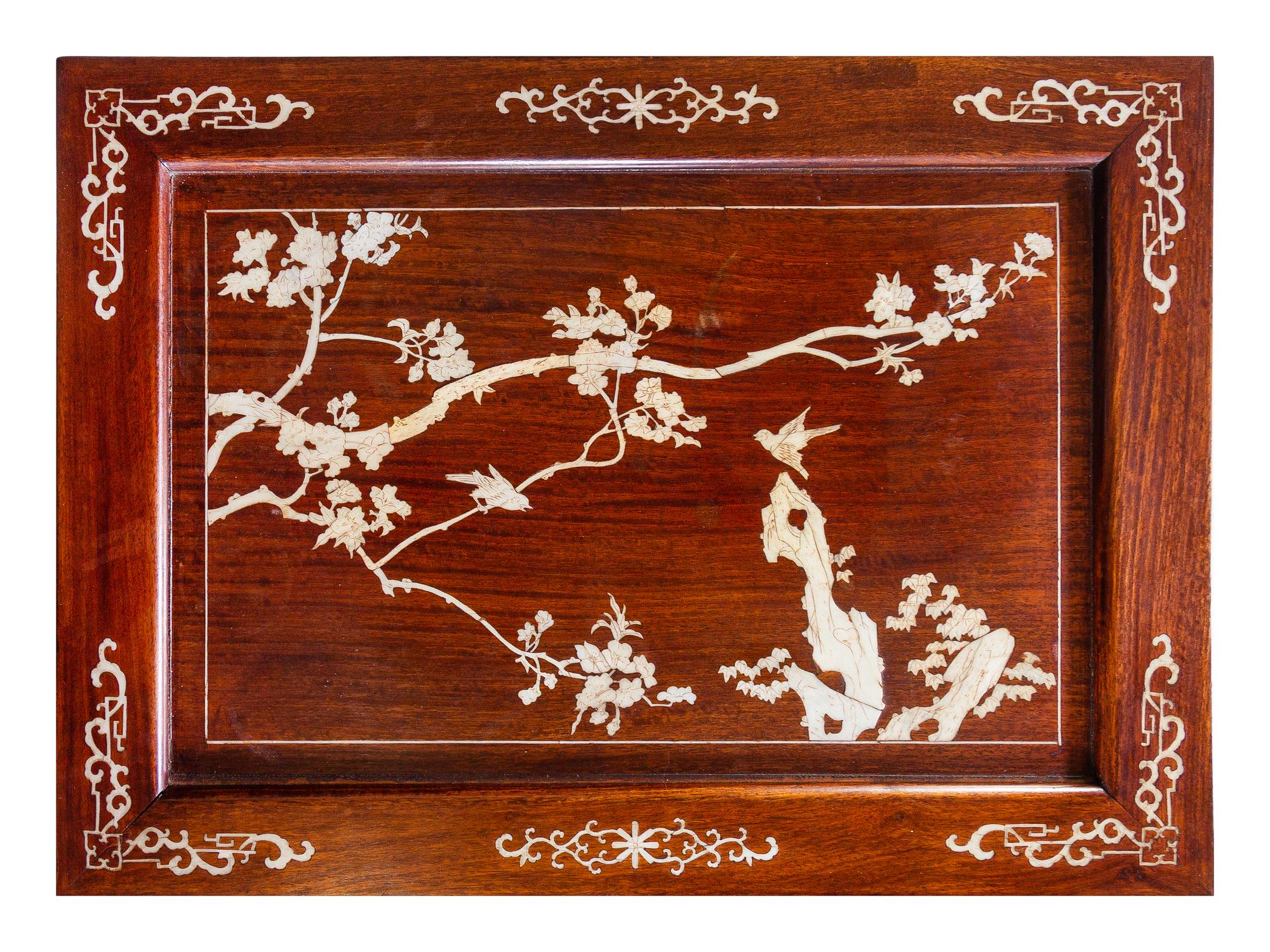 A Set of Four Chinese Hardwood Nesting Tables