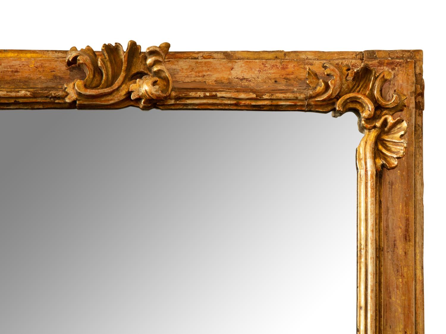 An Italian Baroque Style Painted and Parcel Gilt Mirror