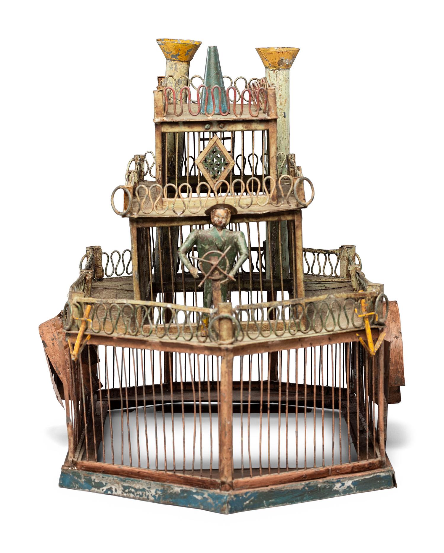 A Folk Art Cut and Painted Metal Paddleboat Form Birdcage