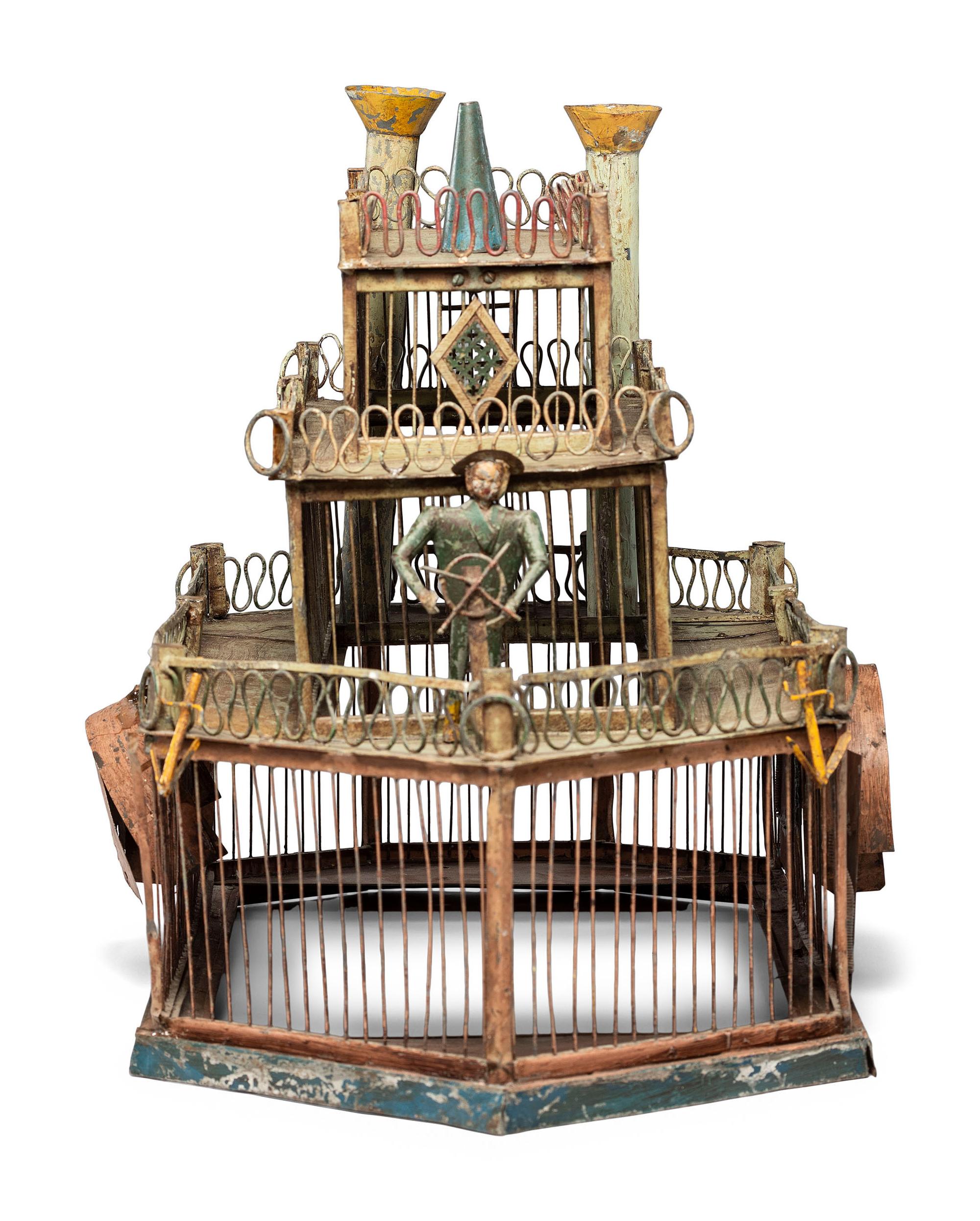 A Folk Art Cut and Painted Metal Paddleboat Form Birdcage