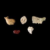 A Group of 5 Near Eastern Amulets