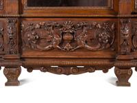 An Italian Renaissance Style Carved Walnut Cabinet