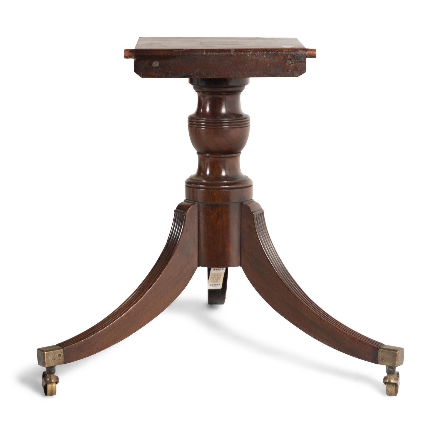 A Regency Mahogany Triple Pedestal Dining Table