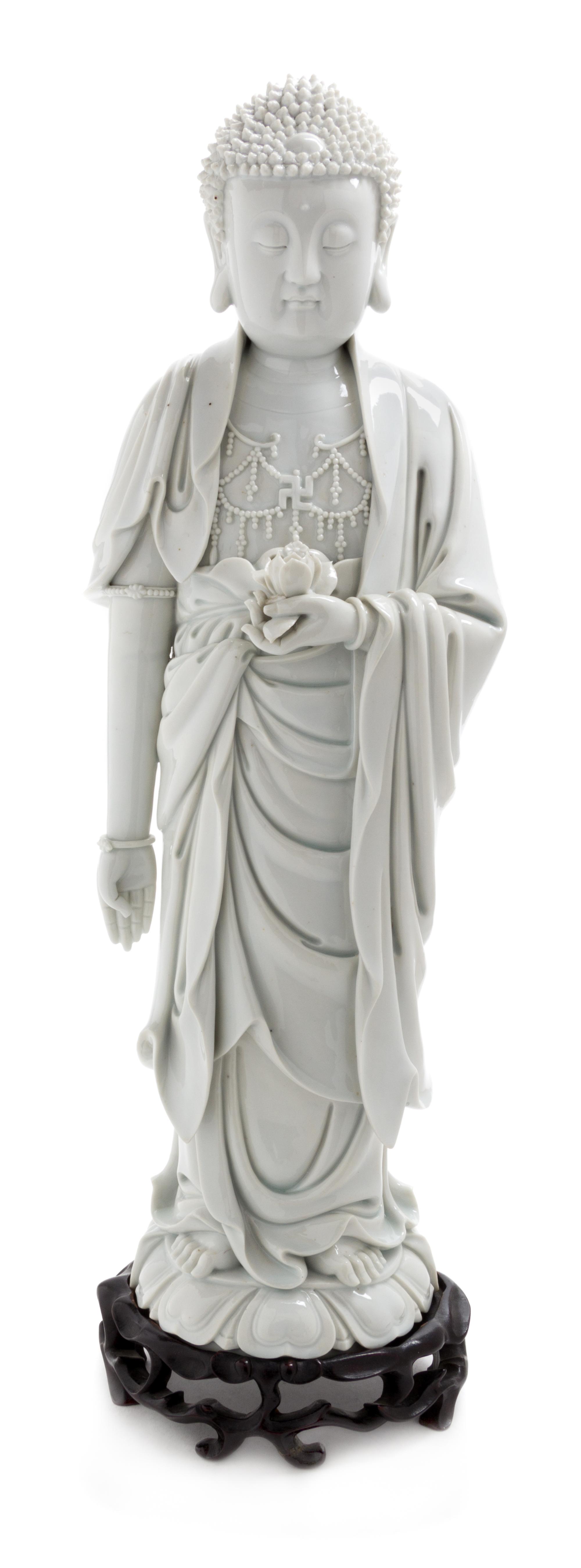 A Large Blanc-de-Chine Porcelain Standing Figure of Buddha Shakyamuni Height 20 1/2 inches. — EARLY 20TH CENTURY