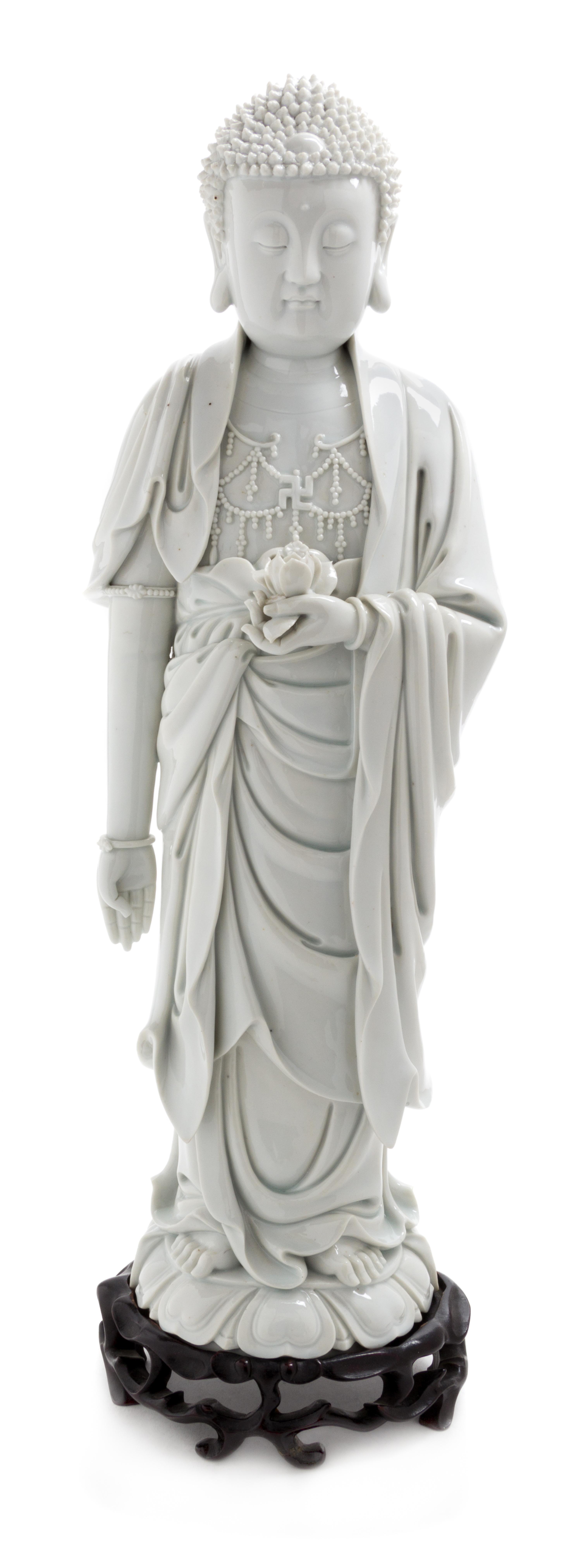 A Large Blanc-de-Chine Porcelain Standing Figure of Buddha Shakyamuni Height 20 1/2 inches. — EARLY 20TH CENTURY