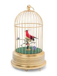 A German Gilt Metal Singing Automaton Bird Cage by Uhren Hauser