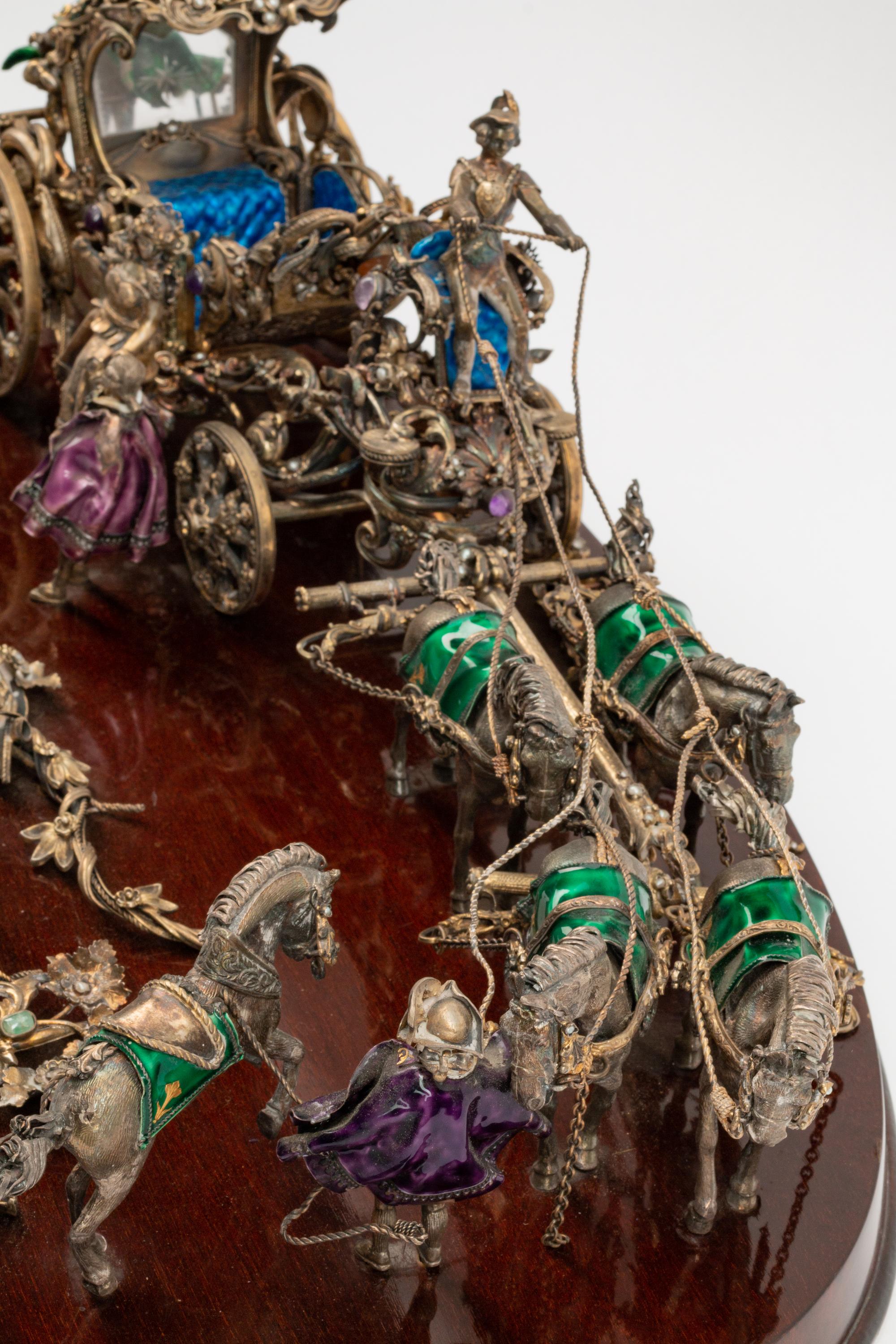 A Continental Jeweled Silver and Enamel Model of a Horse-Drawn Coach — CIRCA 1900