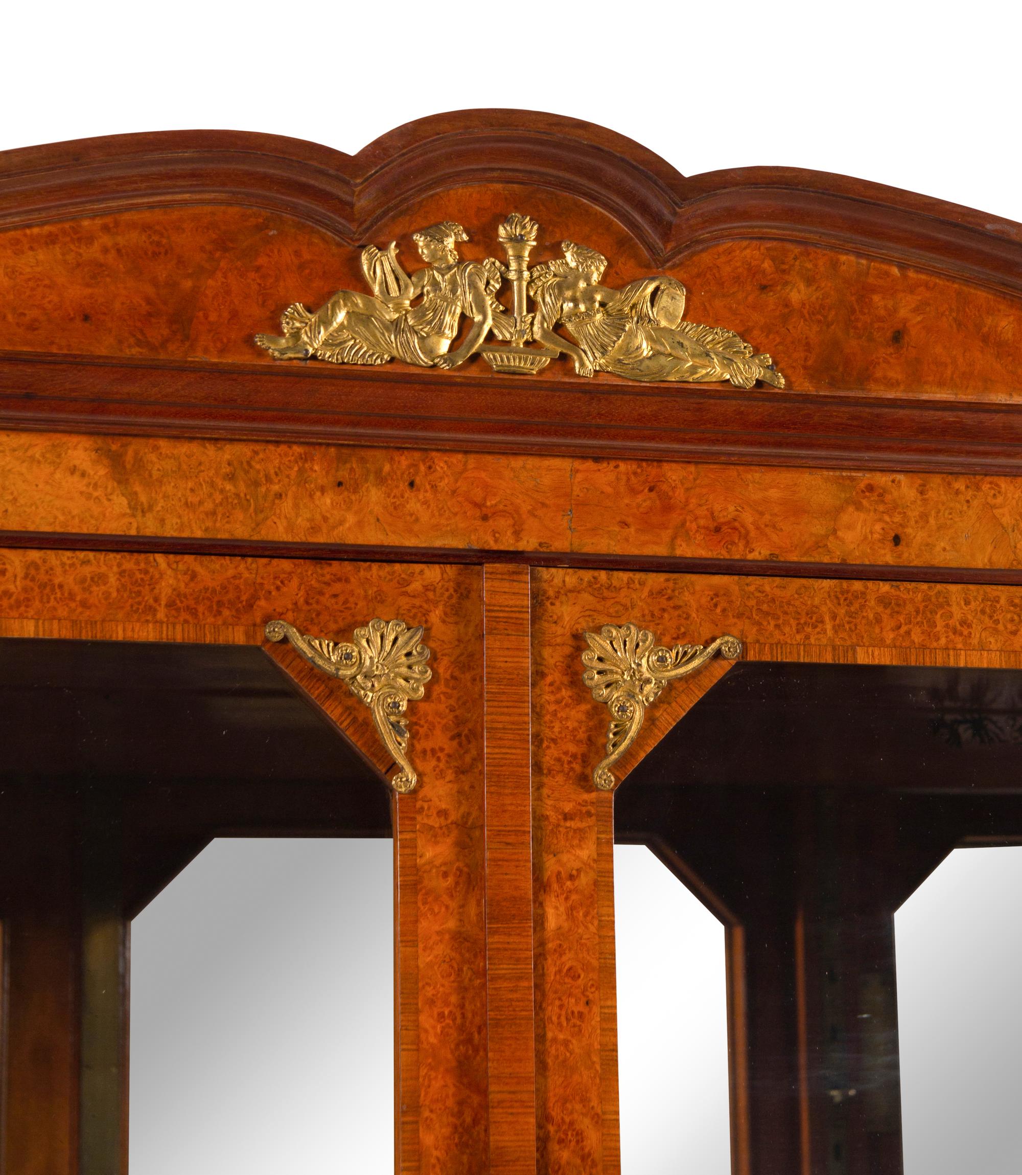 A French Gilt Bronze and Jasperware Mounted Burlwood Dining Suite