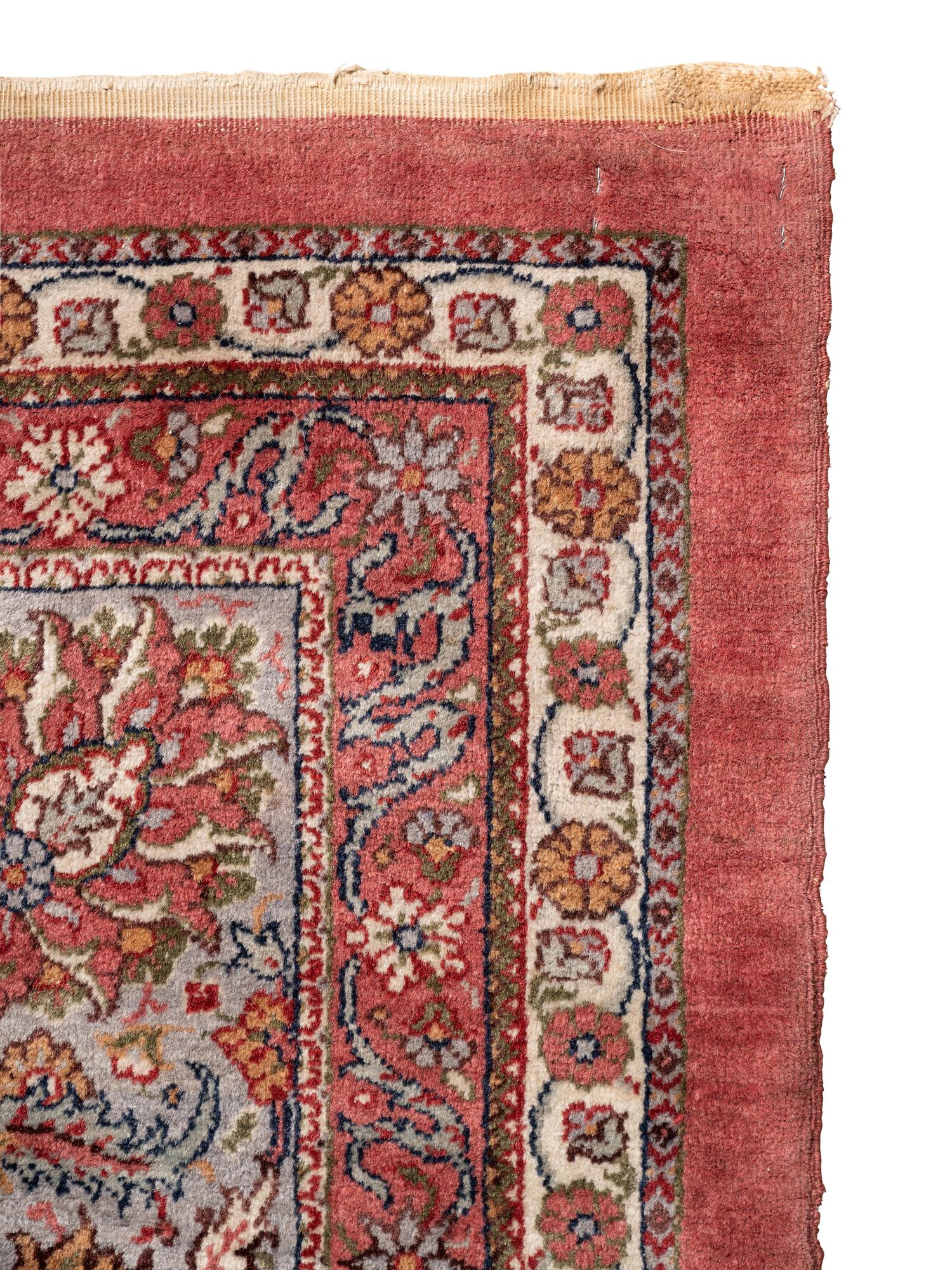 A Tabriz Wool Rug