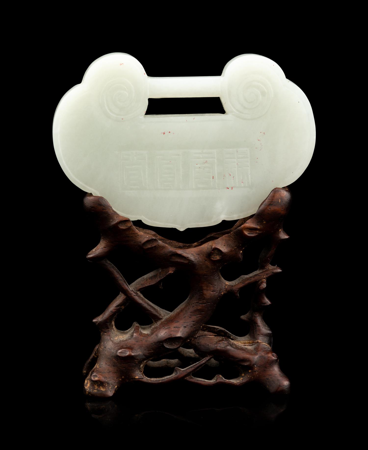 A White Jade Lock-Form Pendant with Stand