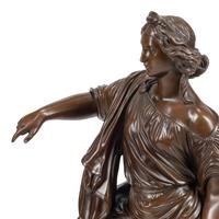 A Pair of French Patinated Bronze Figures
