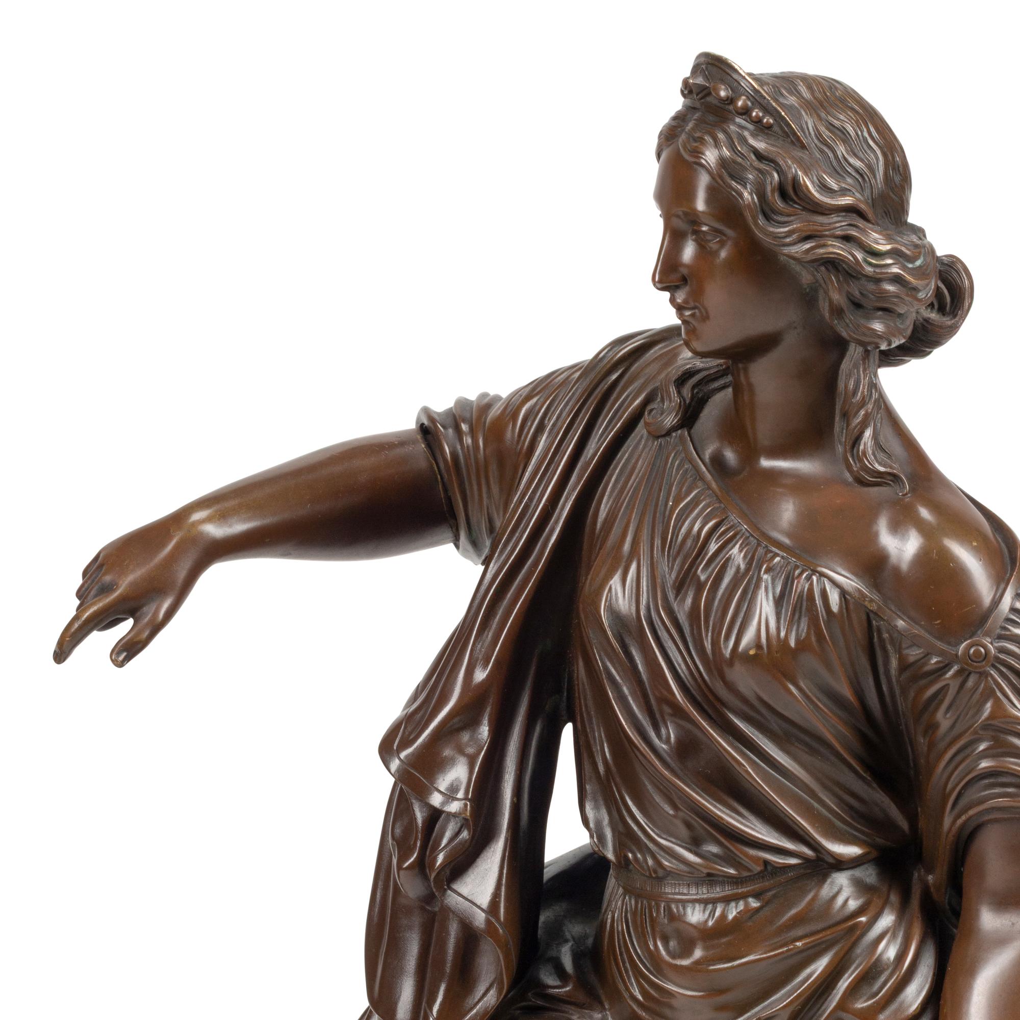 A Pair of French Patinated Bronze Figures