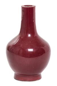 A Small Sang-de-Boeuf Glazed Porcelain Bottle Vase Height 4 3/4 inches.
