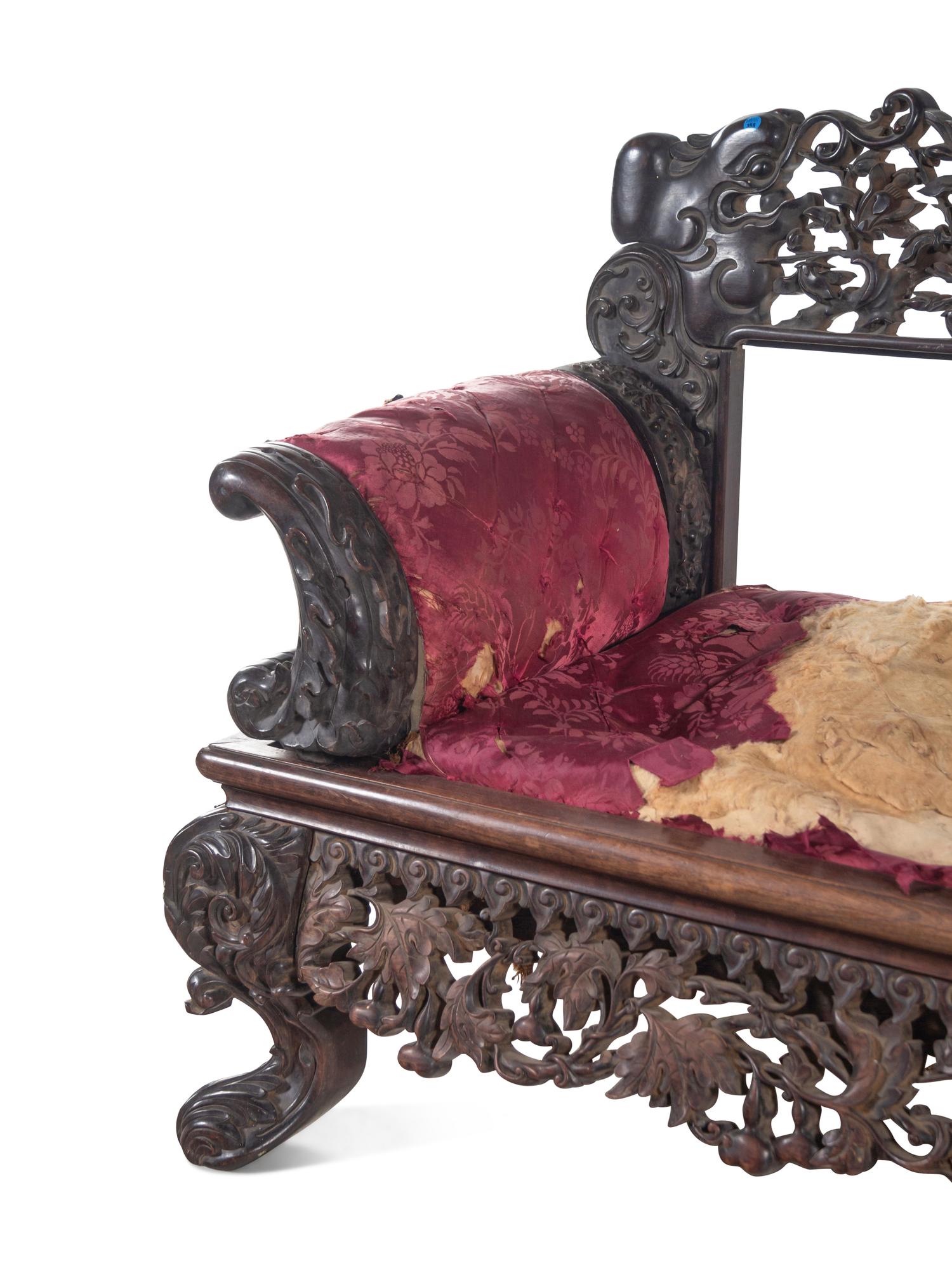 A Chinese Export Carved Hardwood Sofa