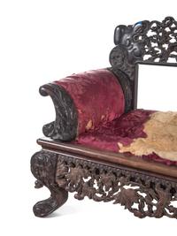 A Chinese Export Carved Hardwood Sofa