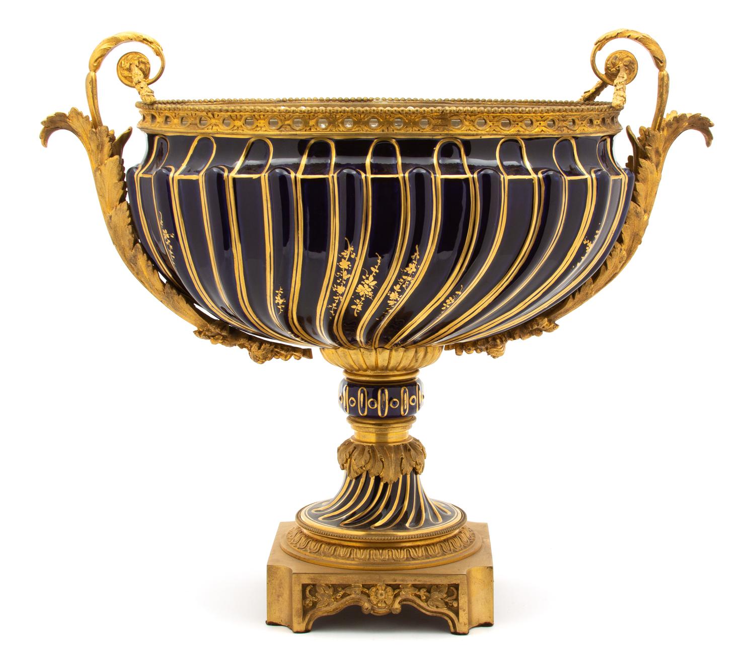 A Louis XVI Style Gilt-Bronze-Mounted Porcelain Centerbowl Height 17 x length 21 x depth 9 inches. — EARLY 20TH CENTURY