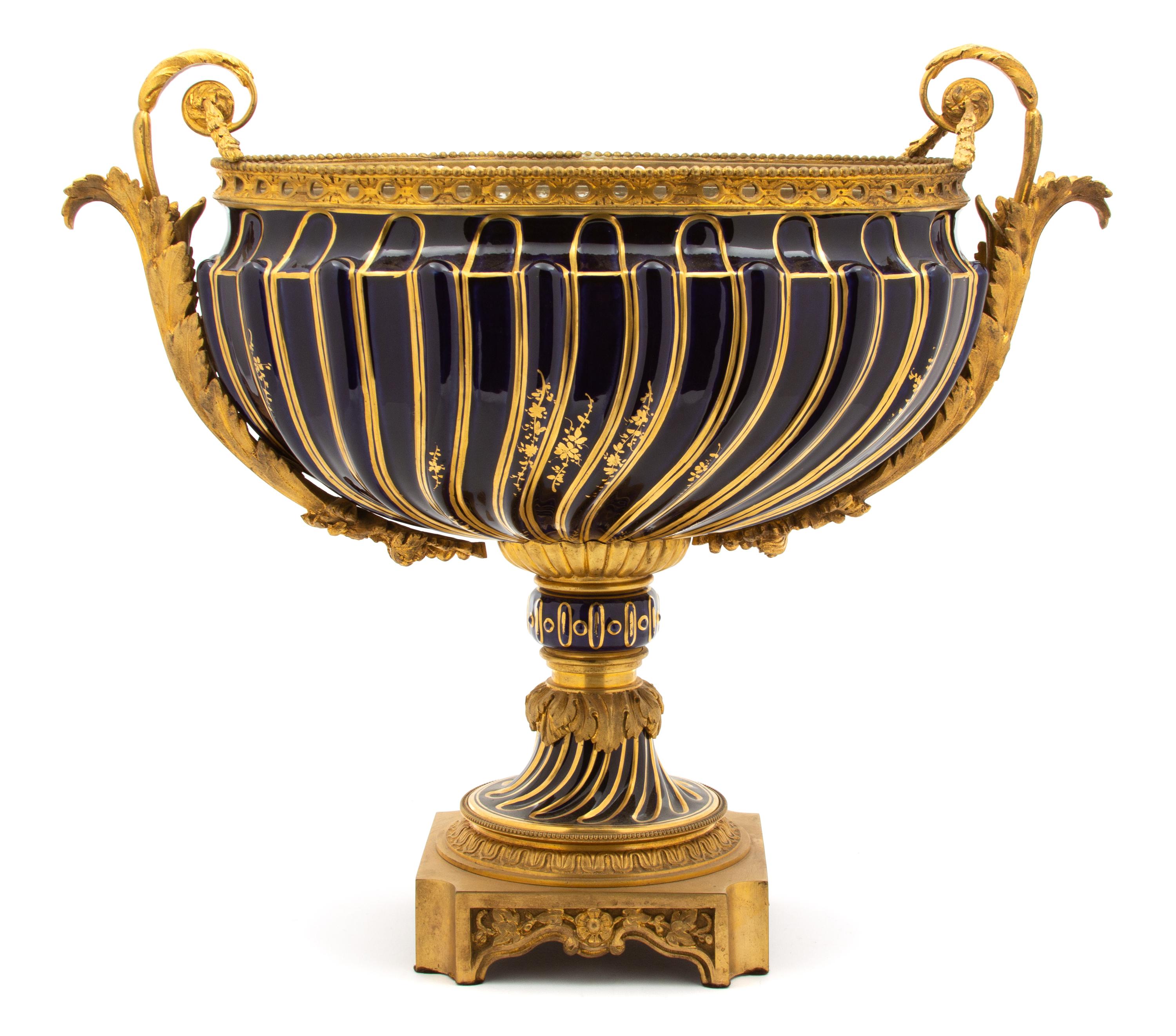 A Louis XVI Style Gilt-Bronze-Mounted Porcelain Centerbowl Height 17 x length 21 x depth 9 inches. — EARLY 20TH CENTURY