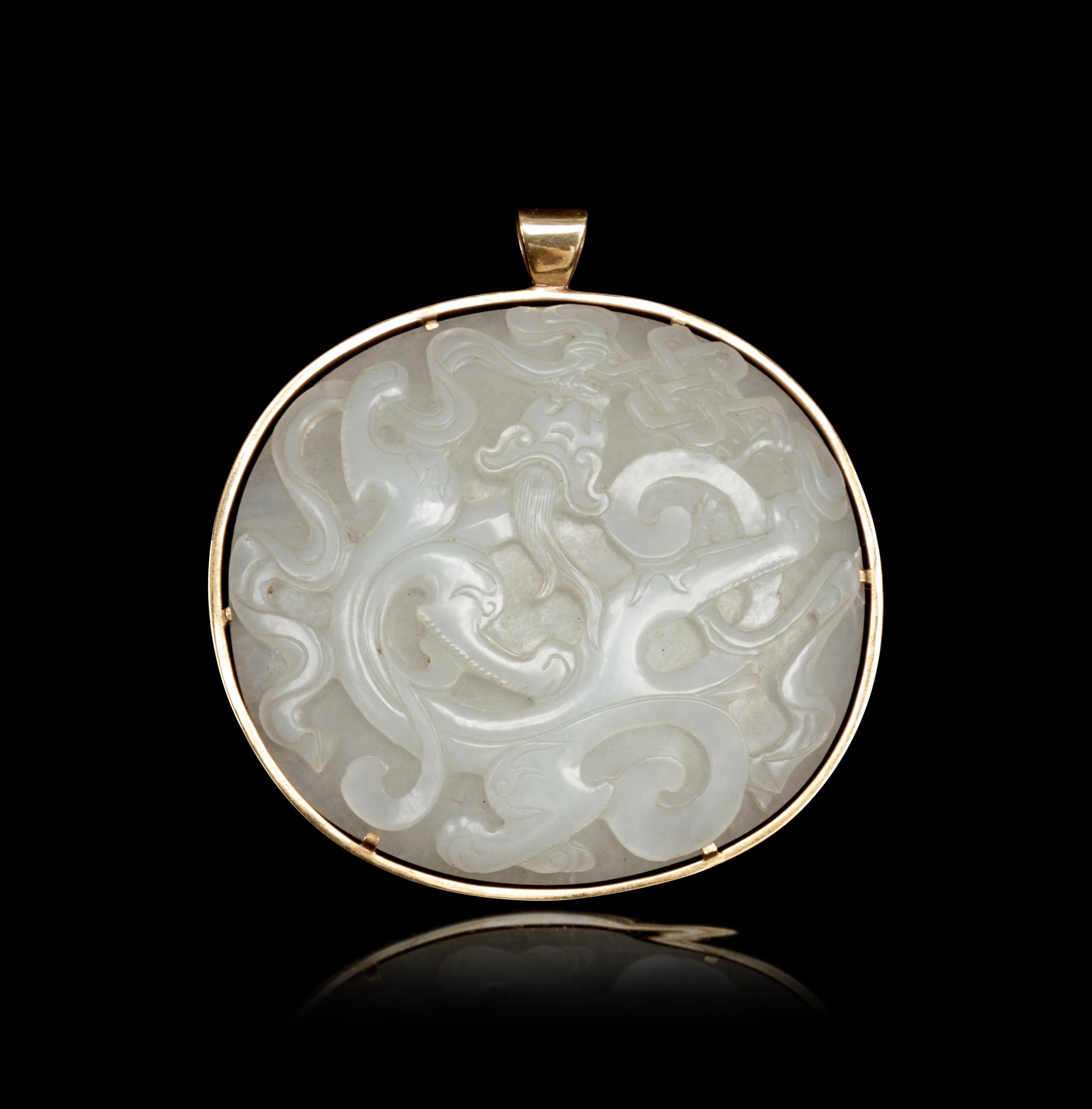 A Carved White Jade 'Chilong' Plaque