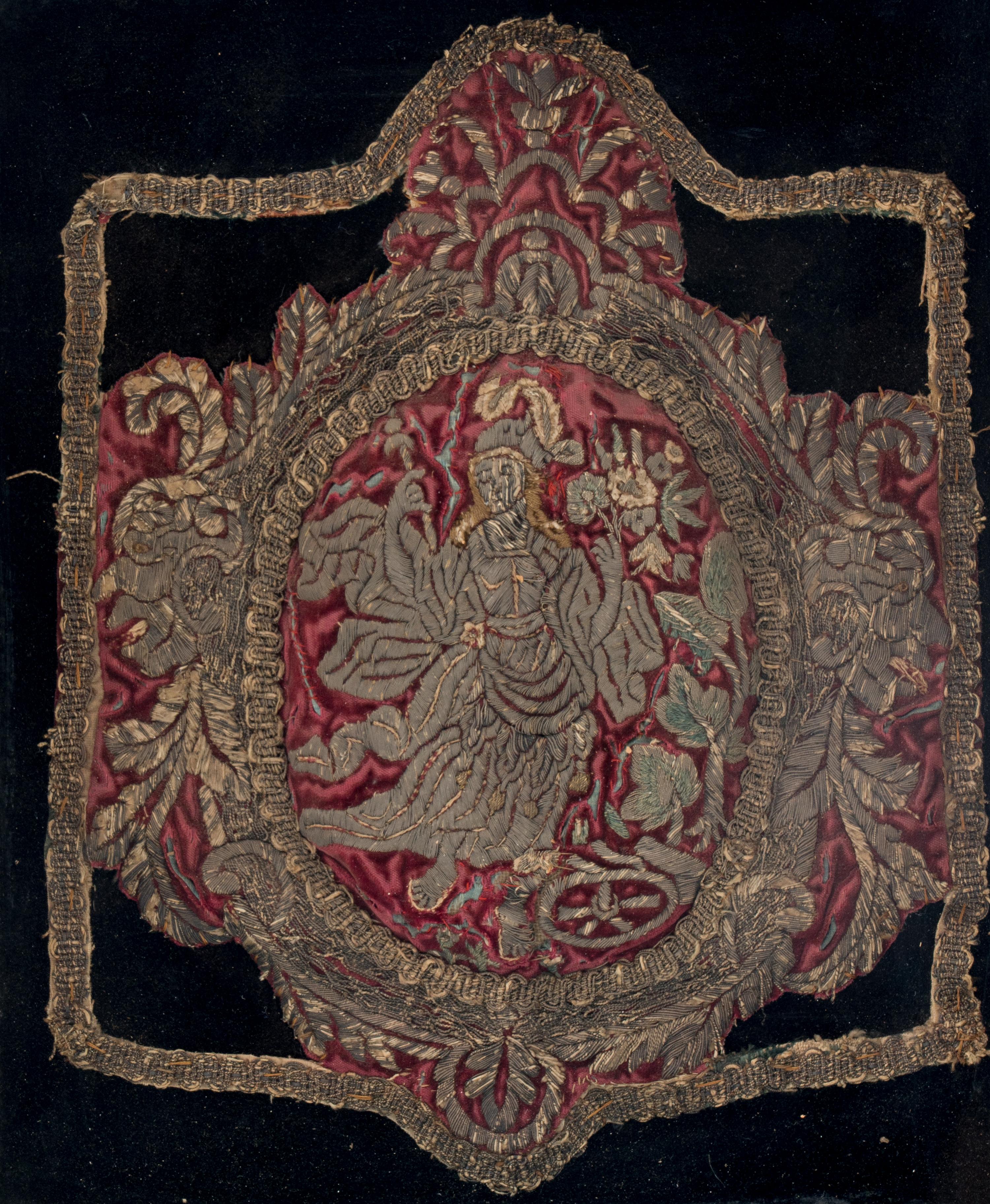 A Red Silk Velvet, Silk and Silver Filé Needlework Medallion