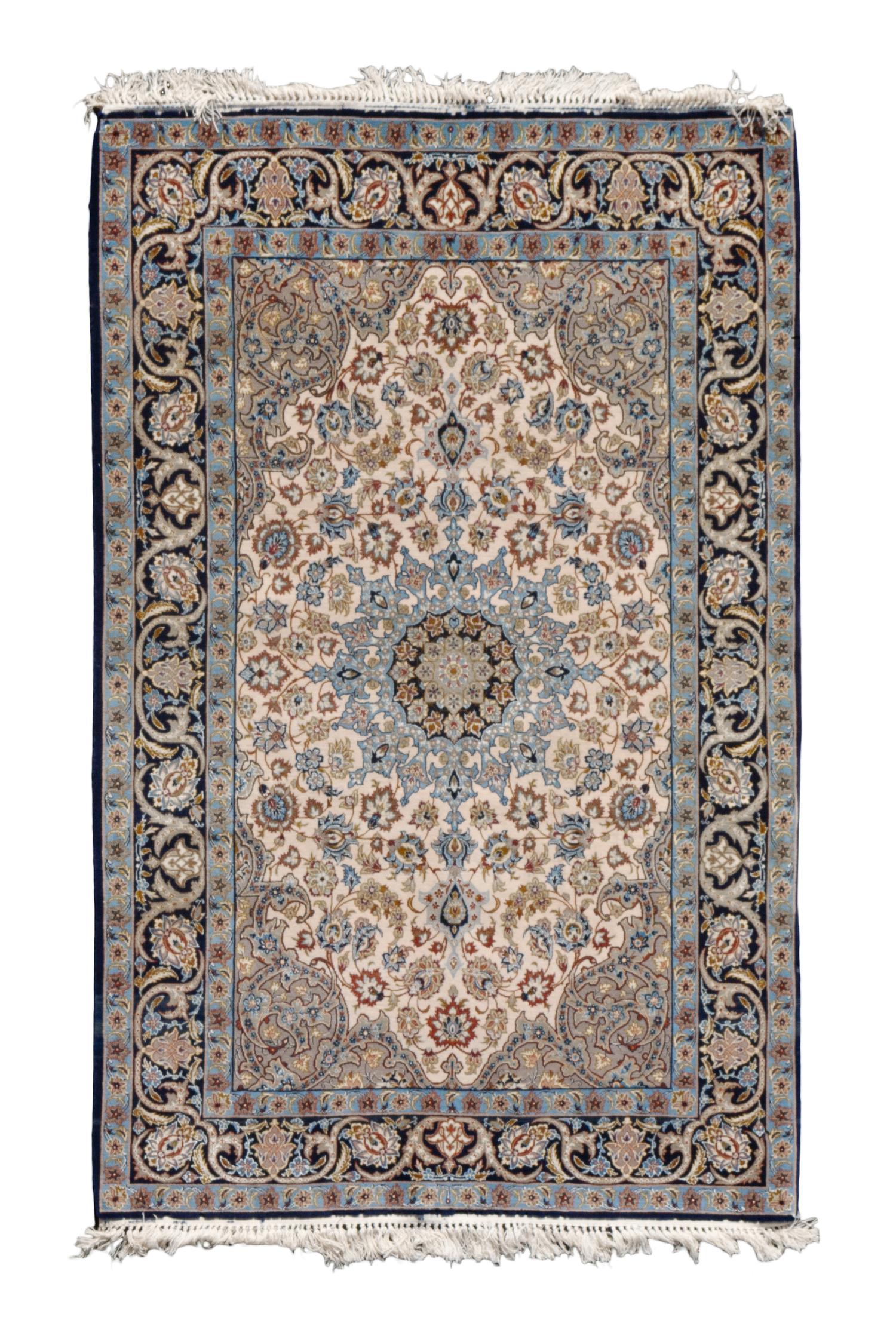 An Isfahan Wool Rug 5 feet 8 inches x 3 feet 7 inches. — 20TH CENTURY