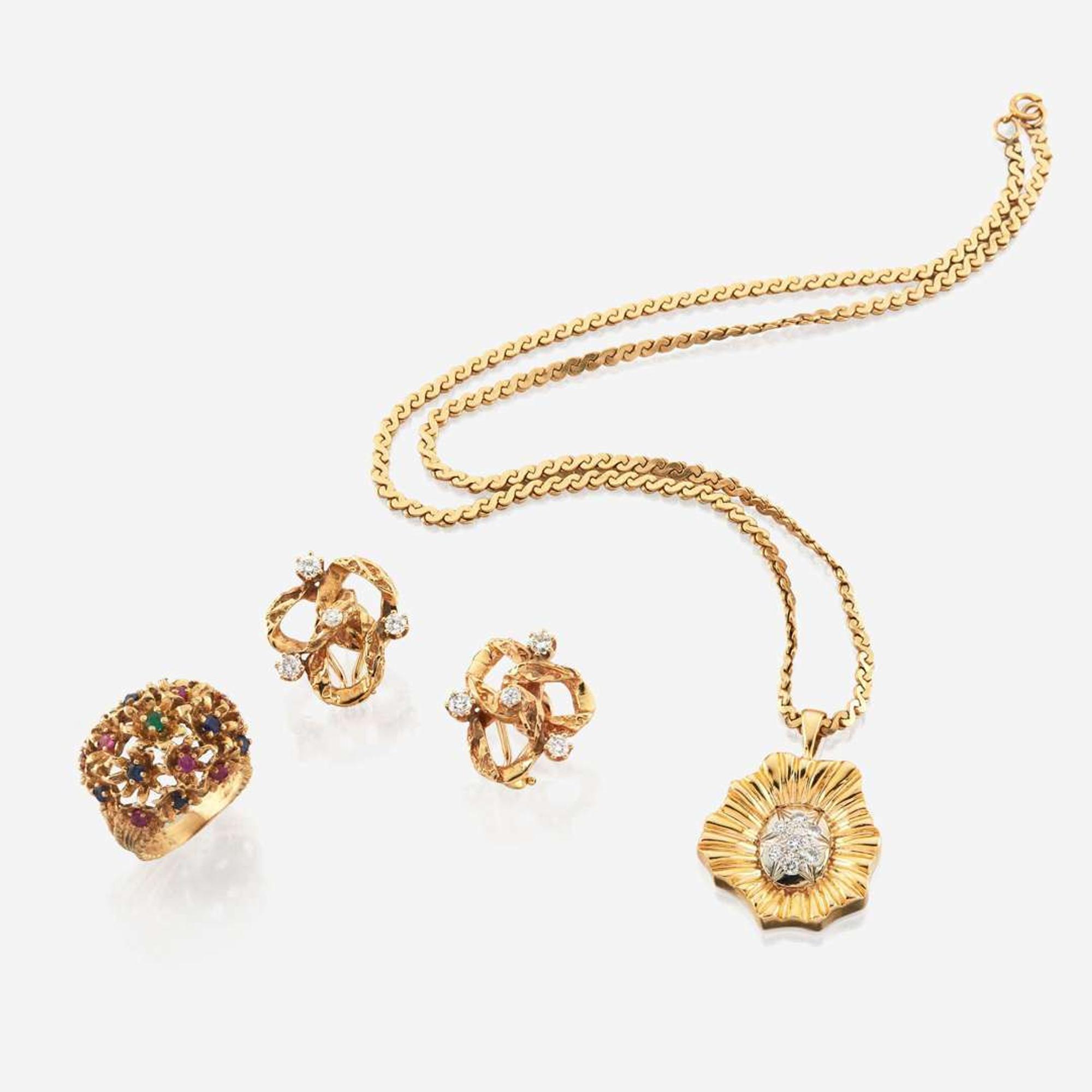 A collection of gold and gem-set jewelry