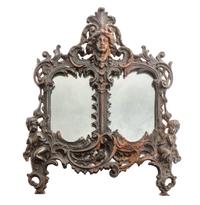 A Continental Bronze Table Mirror 13 1/2 x 12 inches.