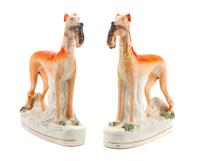 A Pair of Staffordshire Models of Greyhounds Height 11 1/4 inches.