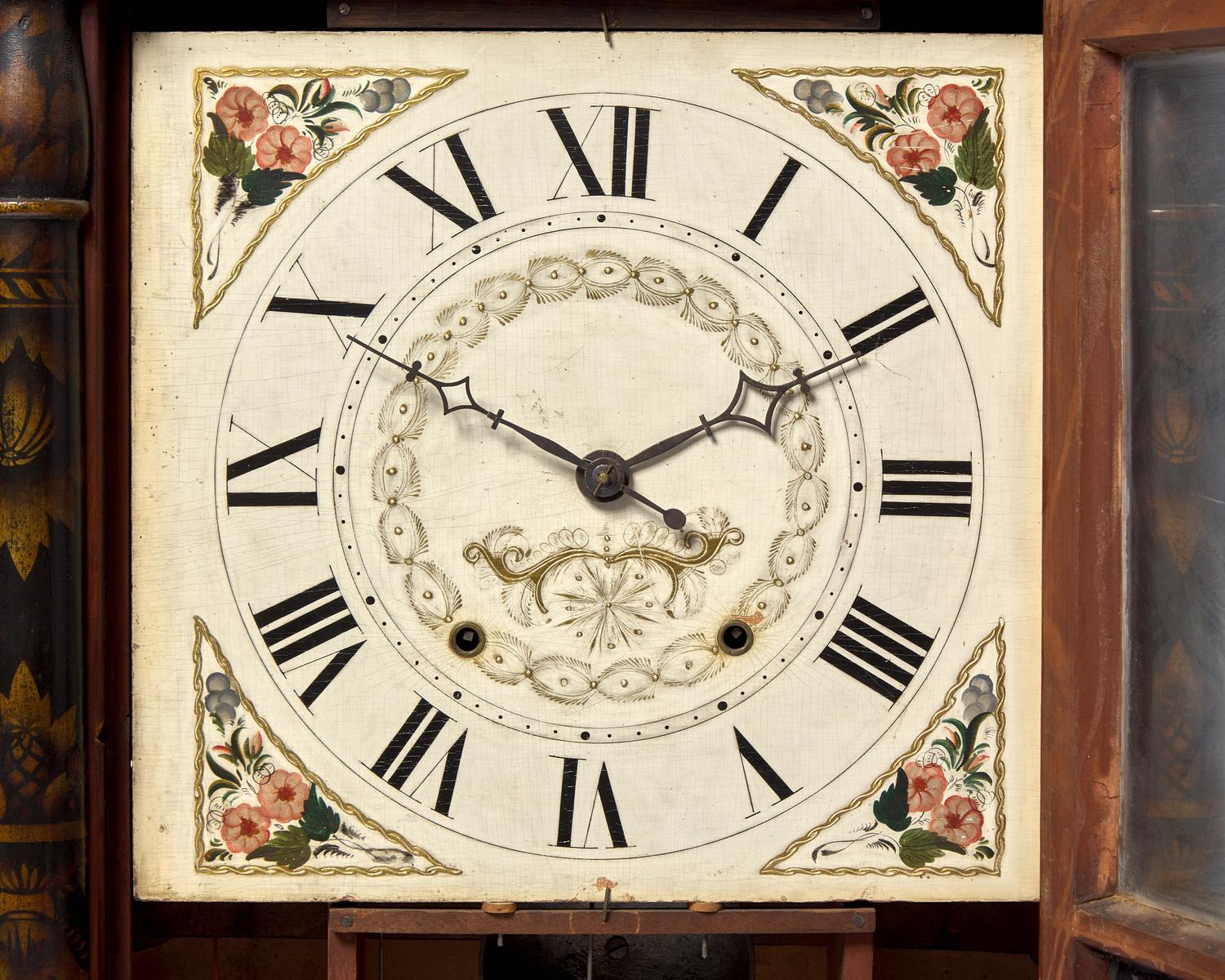 A Classical Carved Mahogany, Stencil-Decorated and Églomisé Shelf Clock