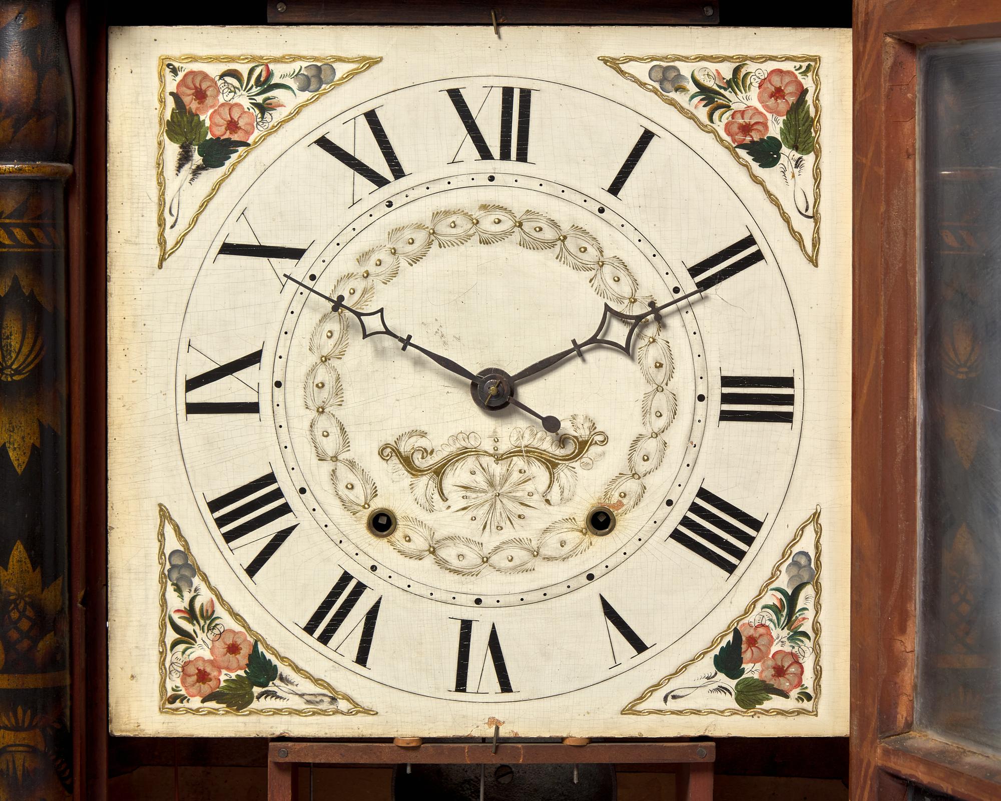 A Classical Carved Mahogany, Stencil-Decorated and Églomisé Shelf Clock