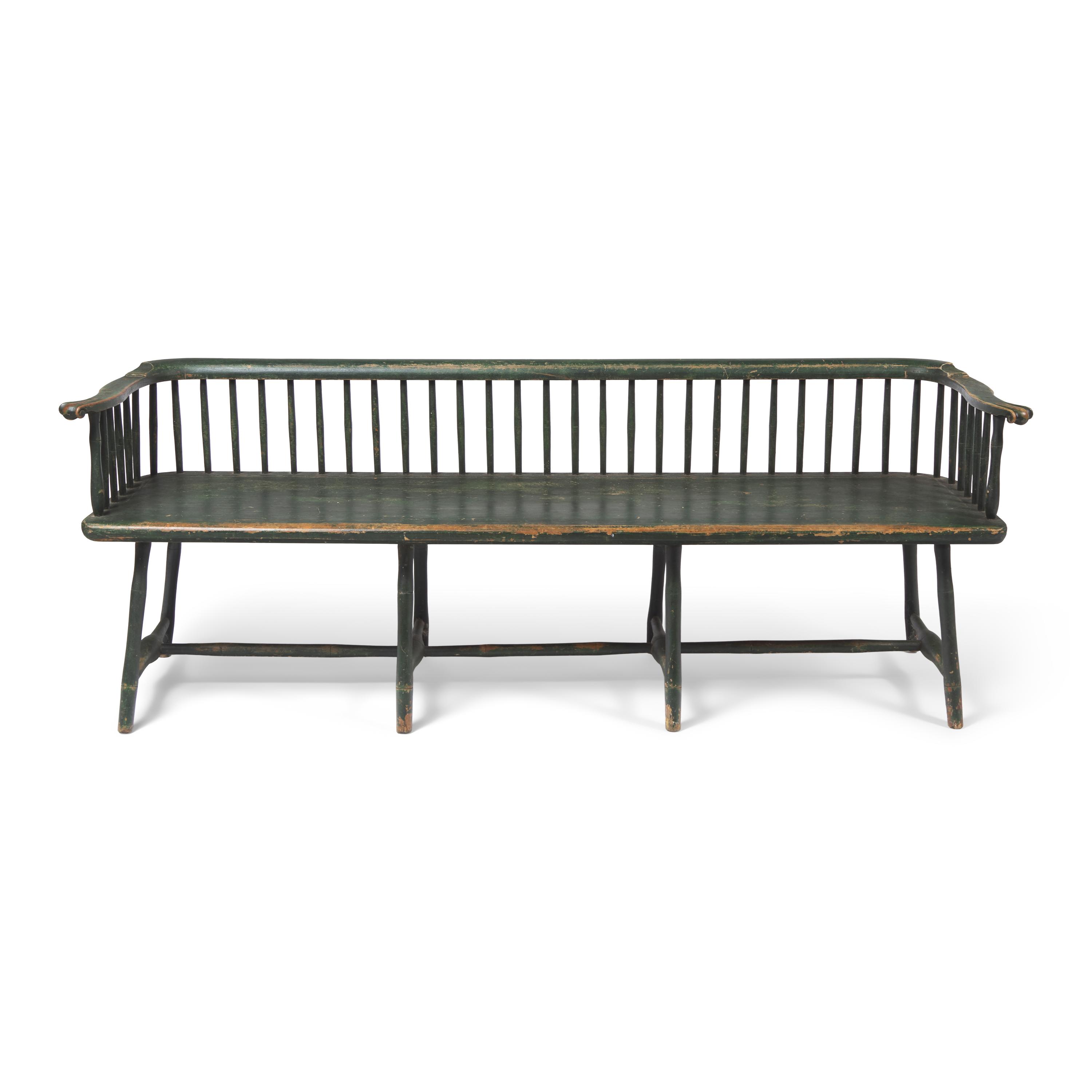 A Green-Painted Low Back Windsor Settee