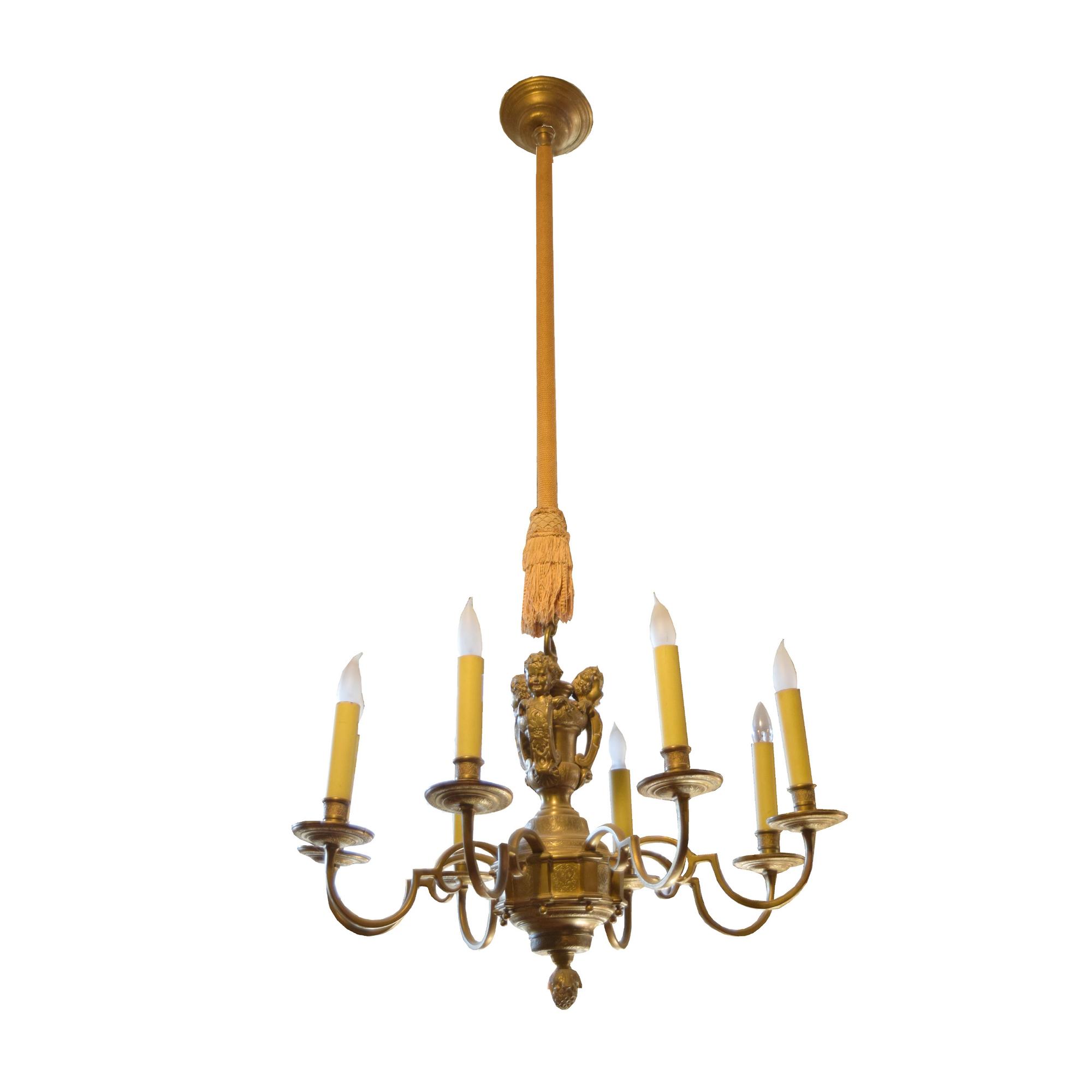 A Pair of Brass Eight Arm Chandeliers 34" W x 34" D x 53" H — United States, Circa 1920
