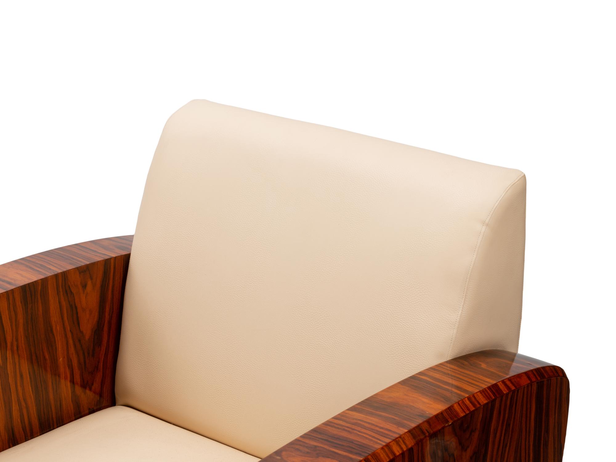 A Pair of Art Deco Style Rosewood Lounge Chairs
