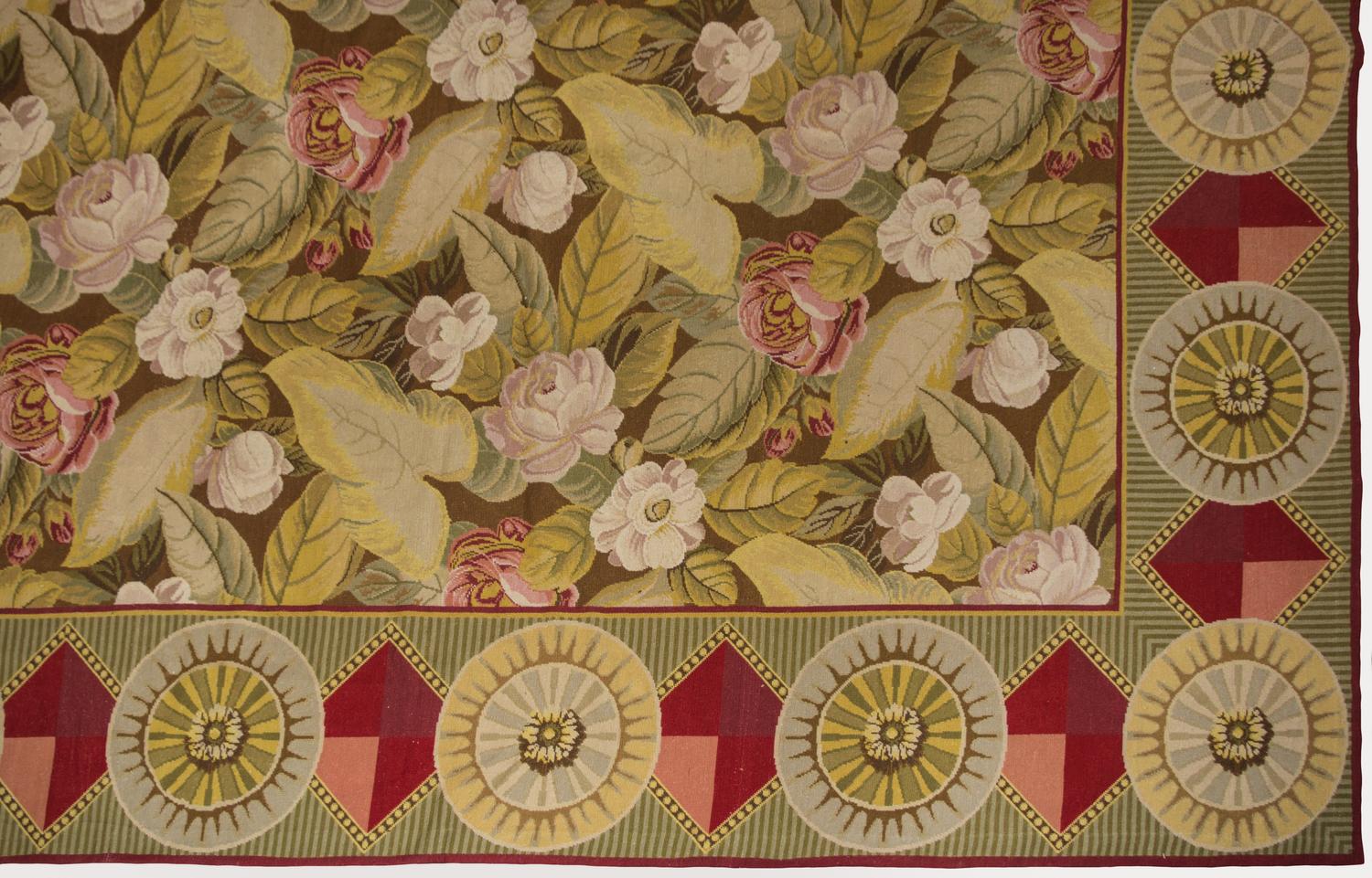 A Continental Needlepoint Rug 16 feet 4 inches x 10 feet 5 inches. — 20TH CENTURY