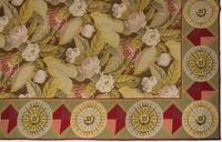 A Continental Needlepoint Rug 16 feet 4 inches x 10 feet 5 inches. — 20TH CENTURY