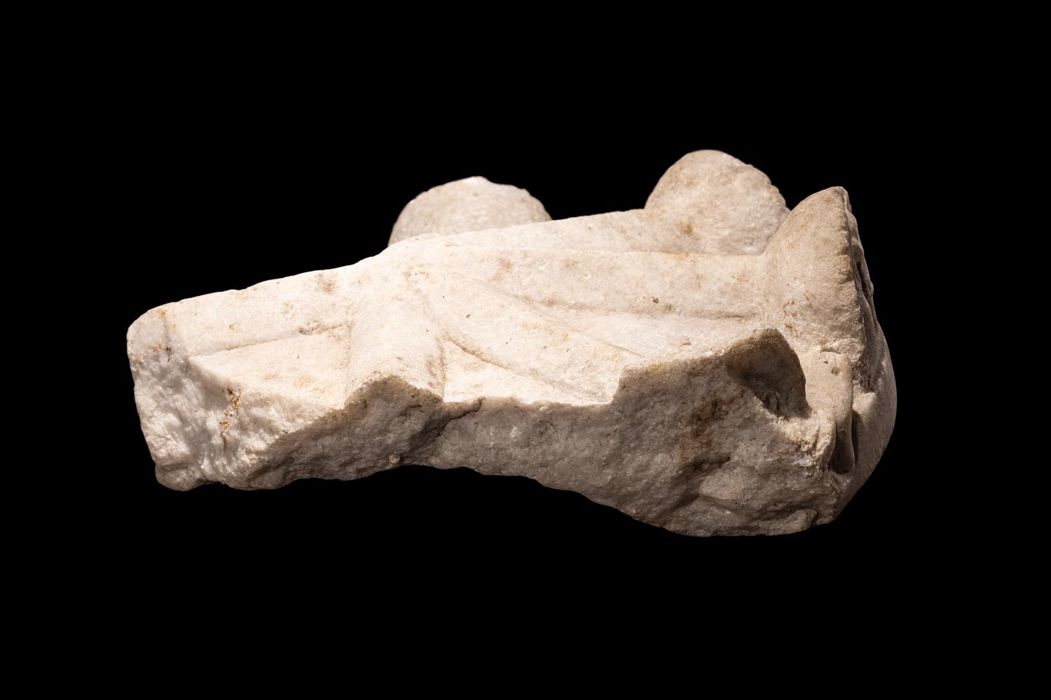 A Roman Marble Cinerarium Fragment