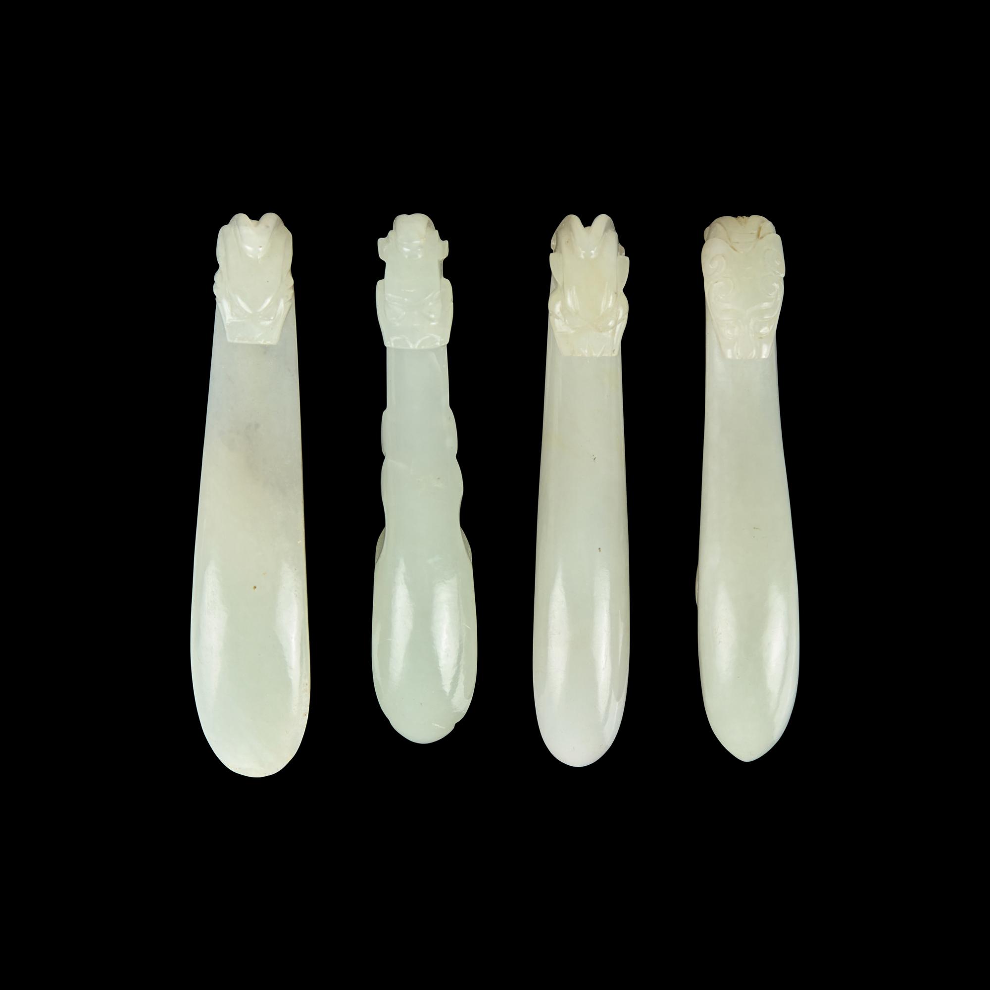 Four Chinese Pale Celadon Jade Belt Hooks, Qing Dynasty 清 青白玉帶鉤四件