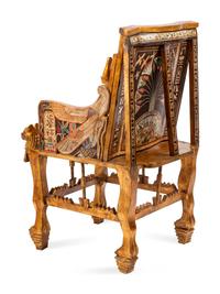 An Egyptian Style Parcel Gilt and Inlaid Throne Chair