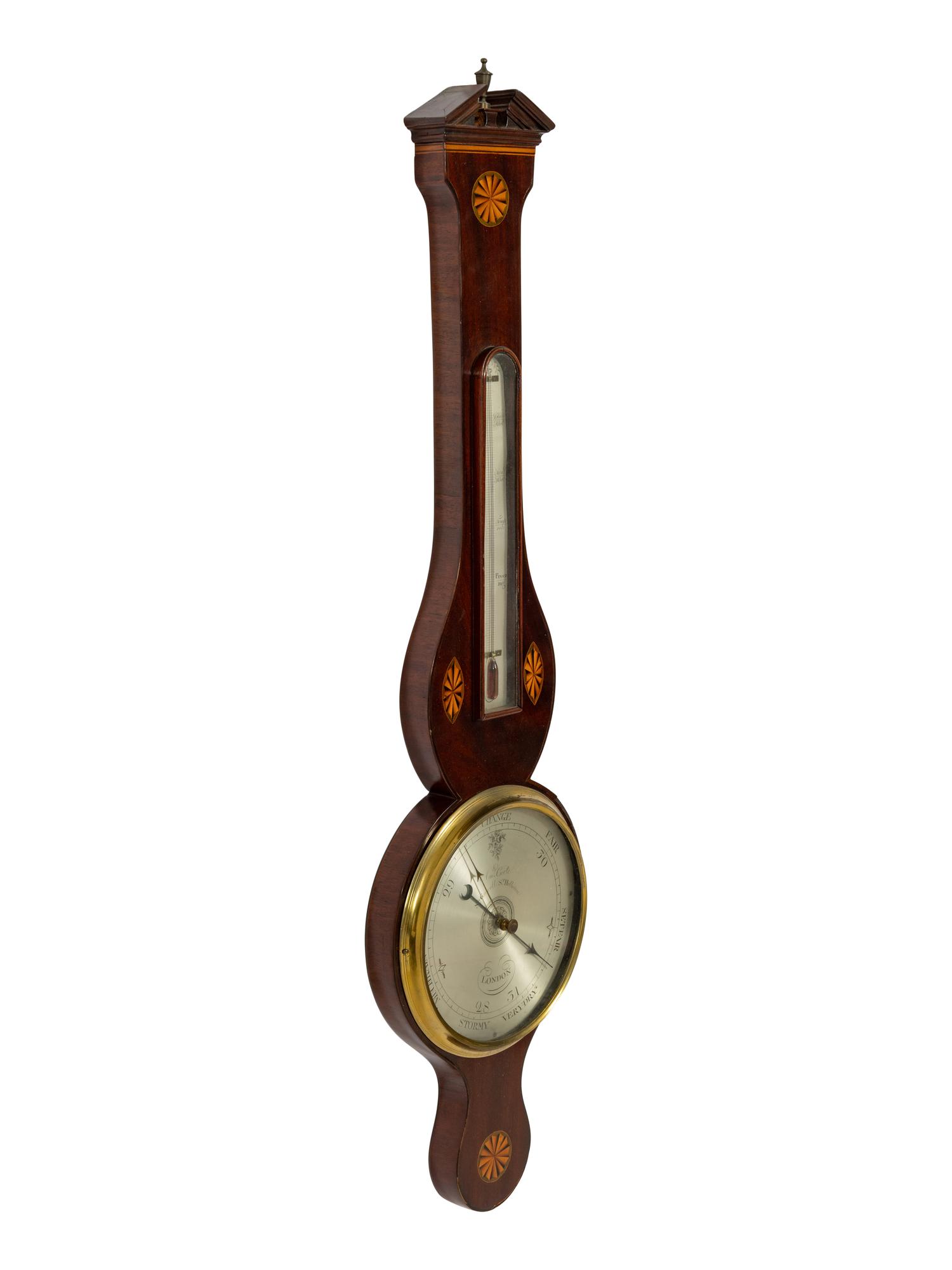 An English Inlaid Mahogany Wheel Barometer and Thermometer